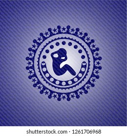 crunch icon inside badge with denim background