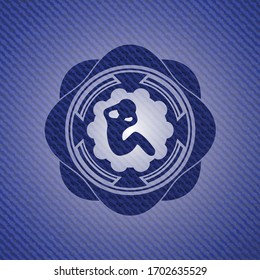 crunch icon inside badge with jean texture. 