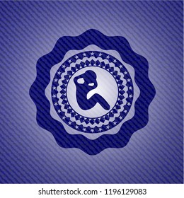 crunch icon inside emblem with denim texture