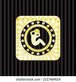 crunch icon inside golden emblem or badge. 