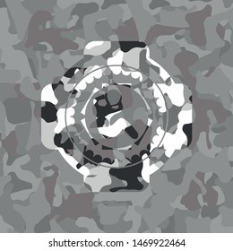 crunch icon inside grey camouflaged emblem