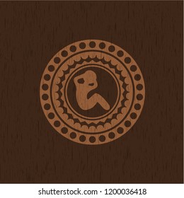 crunch icon inside wooden emblem