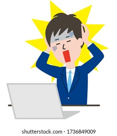hombre asiático llorando operando una laptop