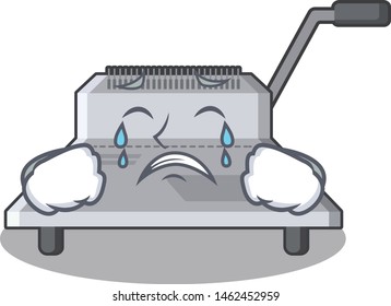 Crying binding machine above wood table cartoon