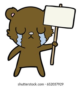 crying cartoon bear with sign