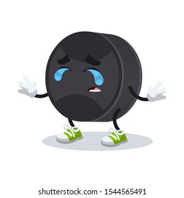 crying cartoon black rubber hockey puck mascot on white background