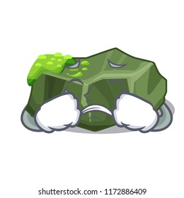 Crying cartoon large stone covered with green moss