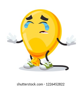 Crying cartoon yellow balloon mascot on white background