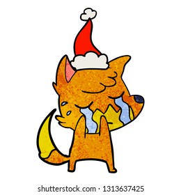 weinender Fuchs, handgezeichnet, strukturierter Cartoon eines mit Santa versehenen Hutes