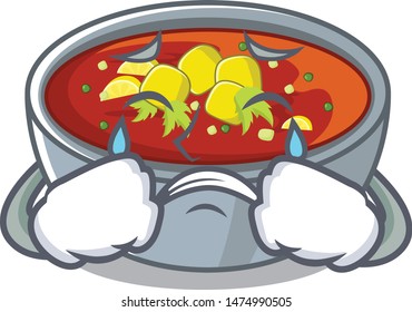 Crying gazpacho dishes above wooden table character