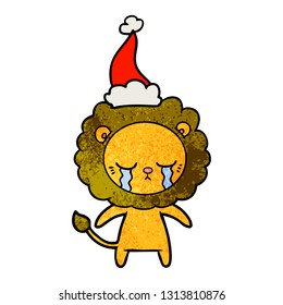 crying hand drawn textured cartoon of a lion wearing santa hat