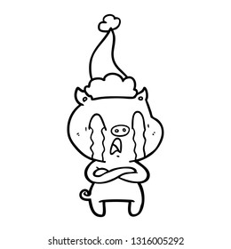 crying pig hand drawn line drawing of a wearing santa hat