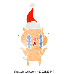 crying pig hand drawn retro cartoon of a wearing santa hat