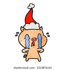 crying pig hand drawn textured cartoon of a wearing santa hat