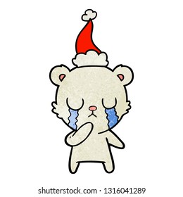 crying polar bear hand drawn textured cartoon of a wearing santa hat
