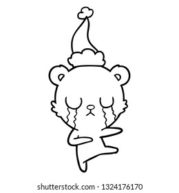 dibujo de la línea del oso polar en llanto dibujado a mano usando un sombrero santa