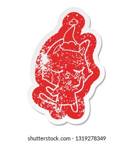 crying quirky cartoon distressed sticker of a cat wearing santa hat