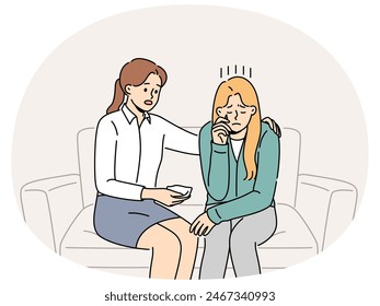 Crying woman at reception of psychologist consoling patient sitting on couch and experiencing stress. Girl sobs in psychologist office after being fired or having problems in personal life