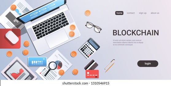 crypto currency block chain concept bitcoin mining workplace desk top angle view tablet laptop computer paper documents report finance graph flat copy space horizontal