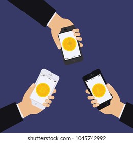 Crypto currency is popular. Design with human hands, phone and gold coins. Mobile banking. Bitcoin - exchange, bitkoyn-extraction, financial operations with a mobile phone. Efirium, Litecoin. 
