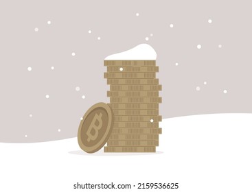 Un concepto de invierno cripto, un montón de bitcoines congelados en el suelo y cubiertos de nieve