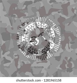 cryptocurrency mining icon inside grey camouflaged emblem