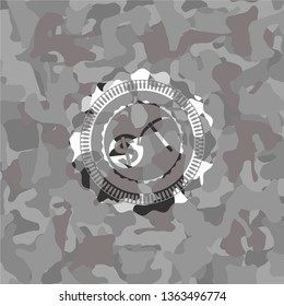 cryptocurrency mining icon on grey camouflaged texture