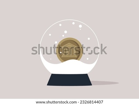 A crystal ball filled with artificial snow, a metal coin inside