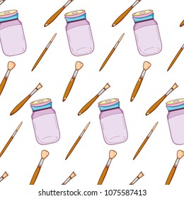 crystal bottle object and paintbrushes background
