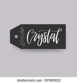 Crystal - common female first name on a tag, perfect for seating card usage. One of wide collection in modern calligraphy style.