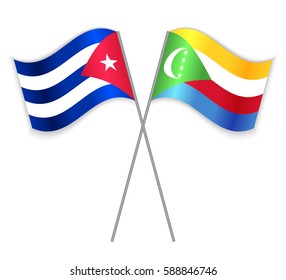 Cuban and Comoran crossed flags. Cuba combined with Comoros isolated on white. Language learning, international business or travel concept.