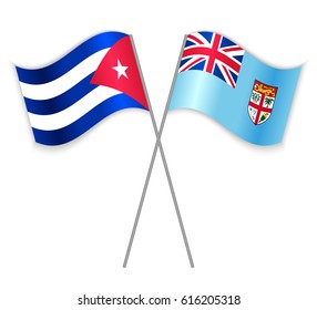 Cuban and Fijian crossed flags. Cuba combined with Fiji isolated on white. Language learning, international business or travel concept.