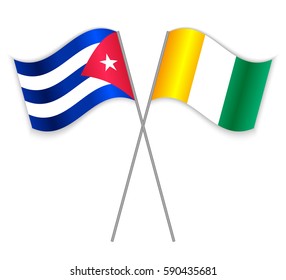 Cuban and Ivorian crossed flags. Cuba combined with Ivory Coast isolated on white. Language learning, international business or travel concept.
