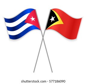 Cuban and Timorese crossed flags. Cuba combined with East Timor isolated on white. Language learning, international business or travel concept.