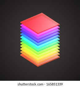 cube consisting of colored glass plates superposed on a dark background