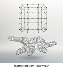 Cube of lines and dots on the arm. The hand holding cube of the lines connected to points. Molecular lattice. The structural grid of polygons. White background. The facility is located on a white