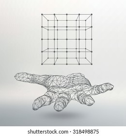 Cube of lines and dots on the arm. The hand holding cube of the lines connected to points. Molecular lattice. The structural grid of polygons. White background. The facility is located on a white