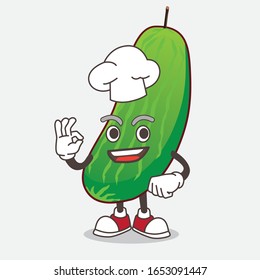 Cucumber cartoon mascot character in a chef dress and white hat