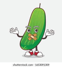 Cucumber cartoon mascot character making a silent gesture