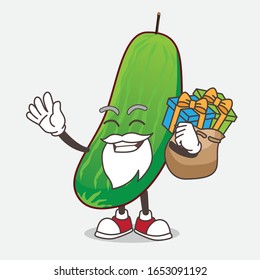 Cucumber cartoon santa mascot character having a sack of gifts