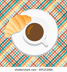 A cup of black coffee with croissant on a white plate.