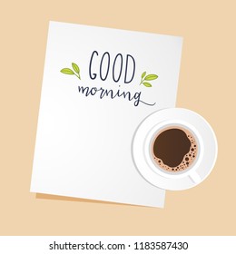 Cup of black coffee and piece of white paper with space for text. Top view.