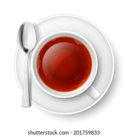 Cup of black tea with spoon over white background