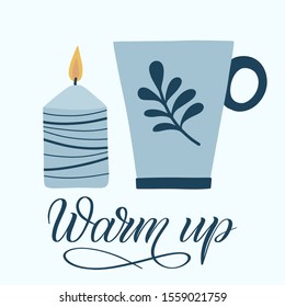 Cup and candle with calligraphy sign Warm Up. Cozy hand drawn illustration element. Isolated vector clipart in shades of blue. Folk art style.