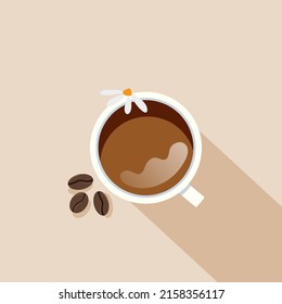 Cup of coffee and coffee beans with chamomile
