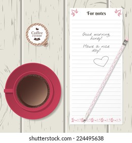 Cup of coffee, coffee cream, pencil and note on a wooden table. Breakfast set