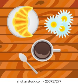 Cup of coffee with croissant on wood background. Top view