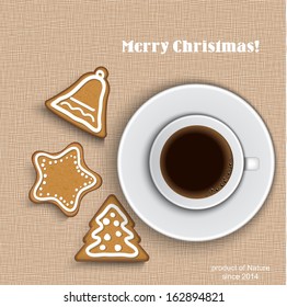 A cup of coffee  with gingerbread on canvas background