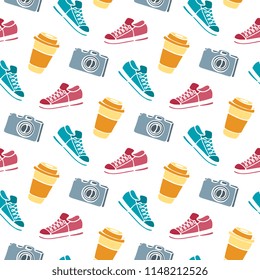 Cup of coffee to go, camera, sneakers seamless pattern hand drawing doodle.