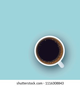 Cup of coffee on blue background, Top view. With space for text your